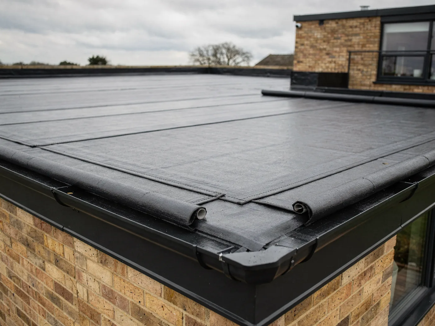 Close-up of a rubber EPDM flat roof installation on a Bristol extension